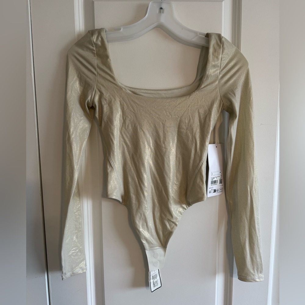Lululemon Athletica Wundermost Metallic Cream Bodysuit
